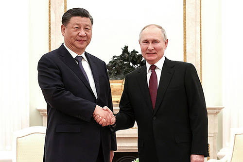 ​악수하는 푸틴 대통령과 시진핑 국가주석